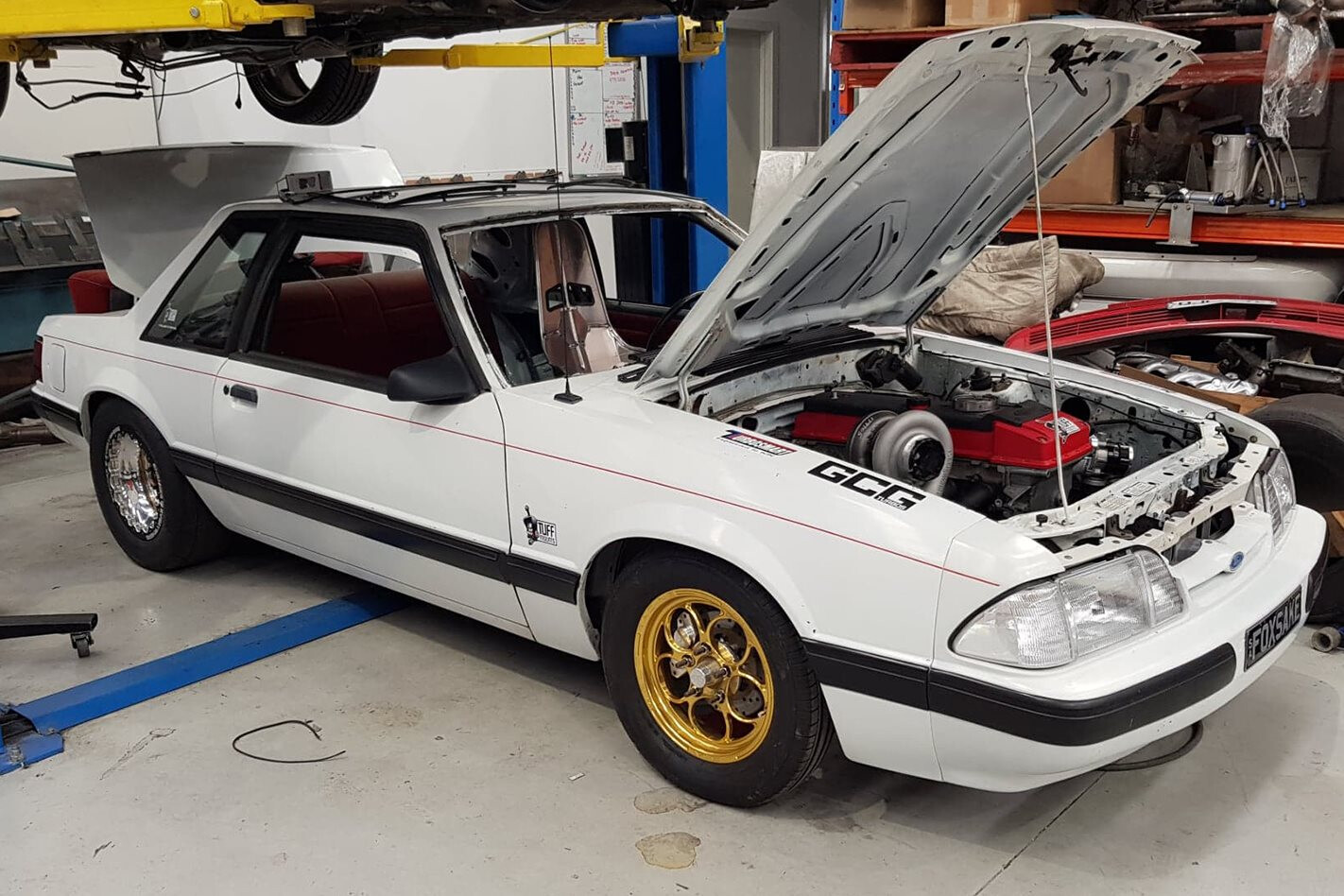 Carnage Plus EP25 Barra-powered Mustang and Valvoline oil station