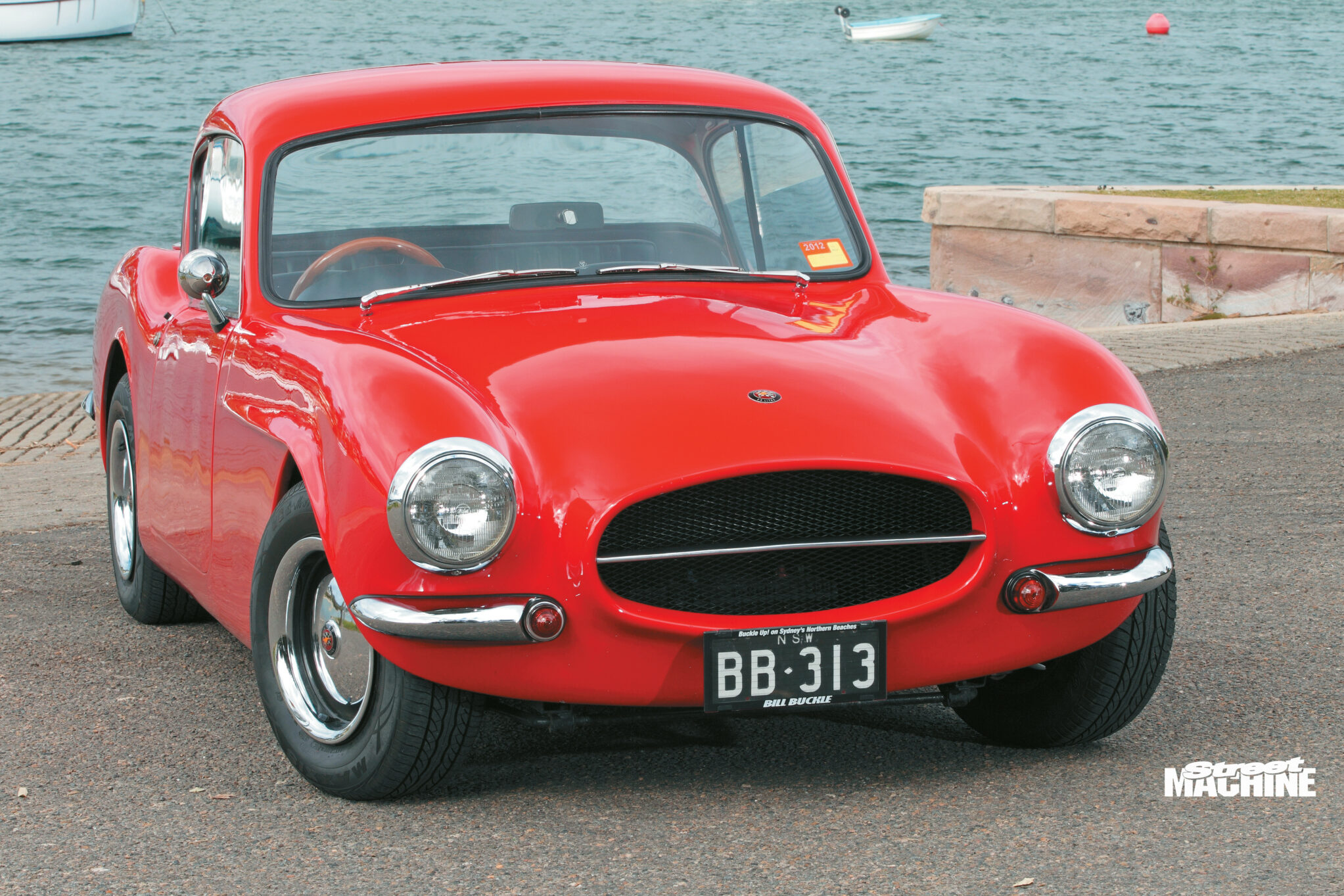 6f8b13f1/buckle sports car front red wm jpg
