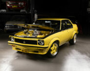 82b59f54/leo mortakis lx torana bonnet up jpg