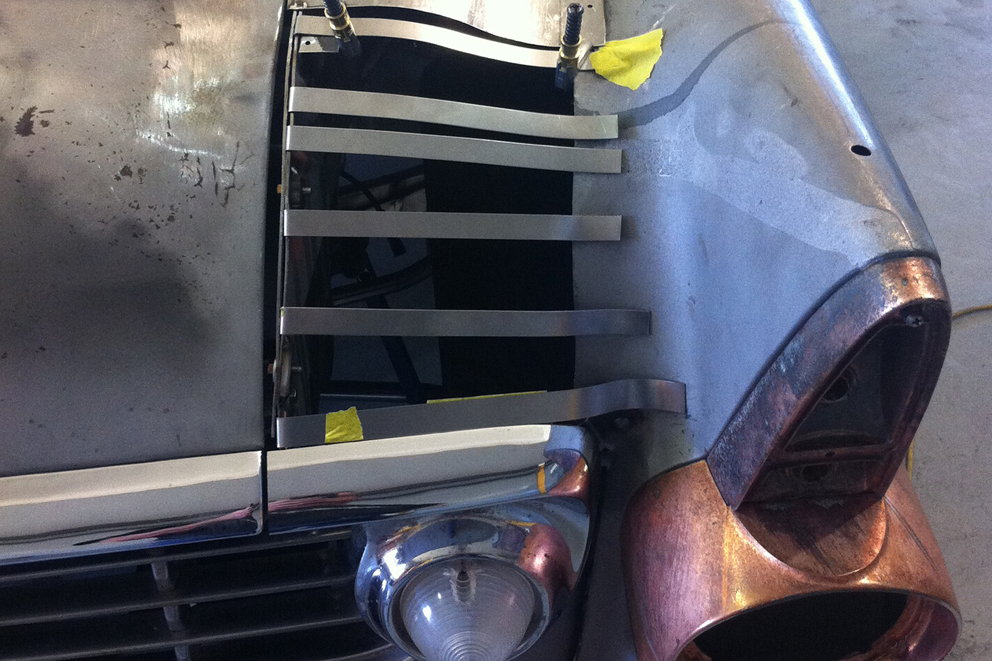 Tailspin headlight buckets